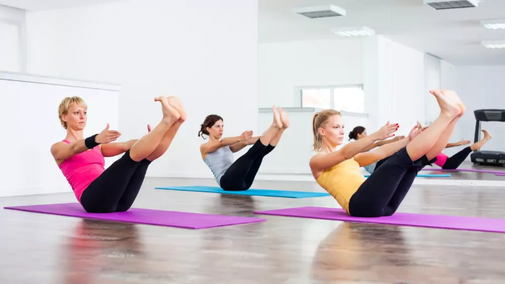 Four-Person Boat Yoga Pose